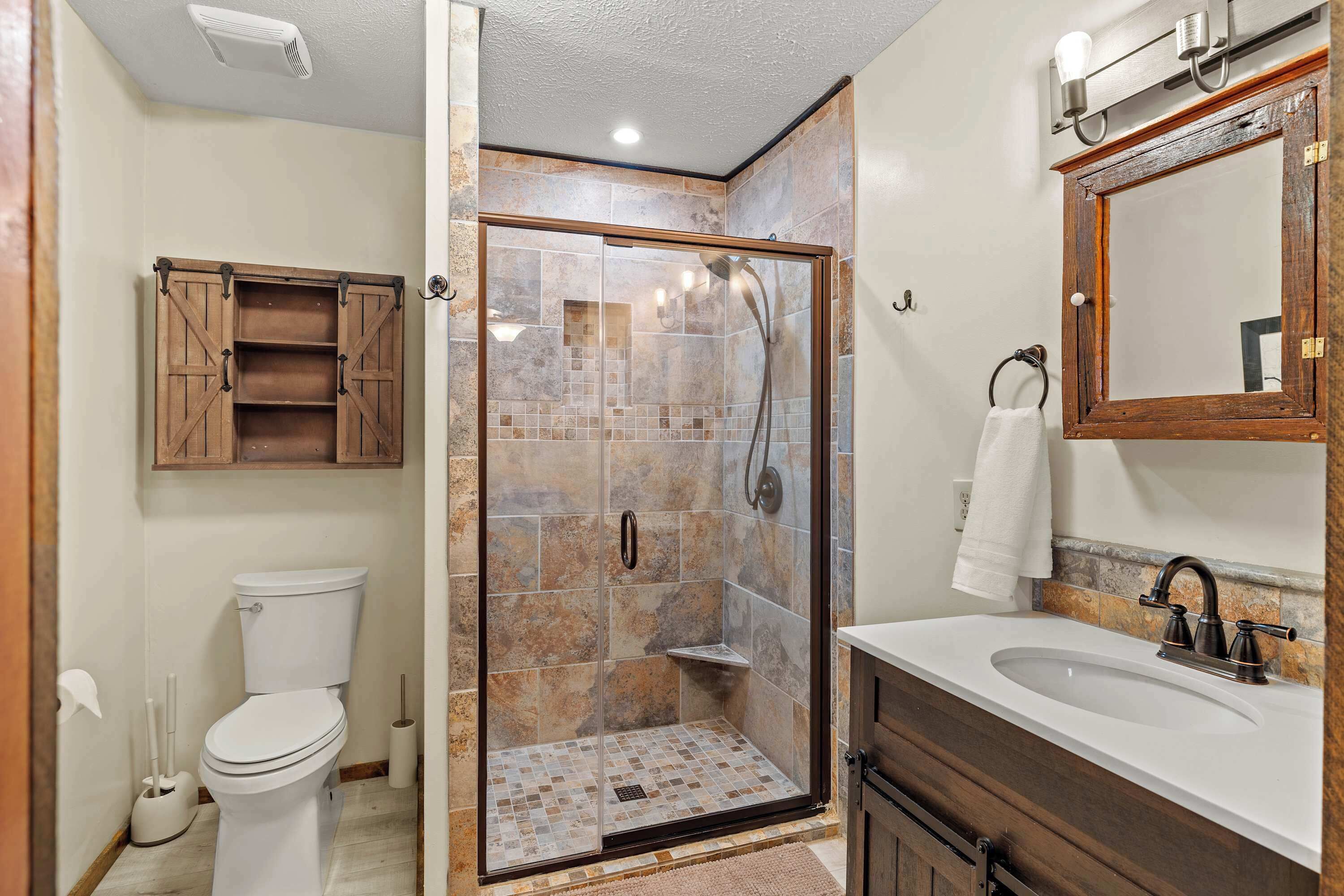 Shower, hair dryer, towels, shampoo