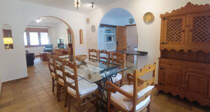 House surrounded by pine trees five kilometers from motorland in a very quiet village