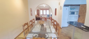 House surrounded by pine trees five kilometers from motorland in a very quiet village
