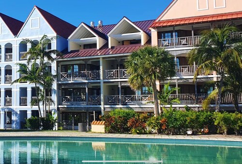 Taino Beach Bahamas 1 or 2 bedroom suite poolside with covered patio and beach