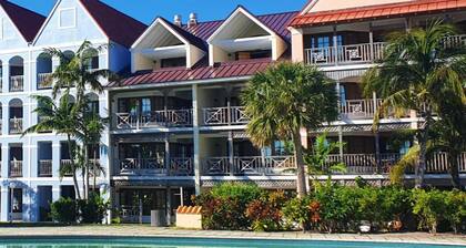 Taino Beach Bahamas 1 or 2 bedroom suite poolside with covered patio and beach