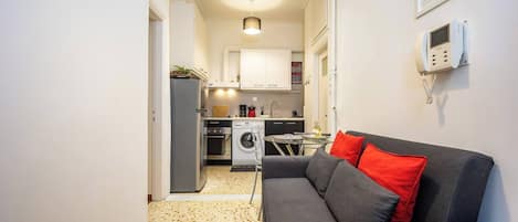 Appartement, 1 chambre, accessible aux personnes à mobilité réduite | Salle de séjour | Livres