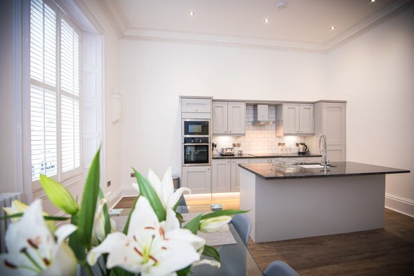 Microwave, oven, cookware/dishes/utensils