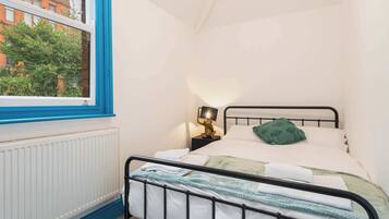2 bedrooms, travel cot, WiFi, bed sheets