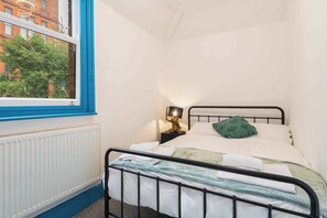 2 bedrooms, travel crib, WiFi, bed sheets