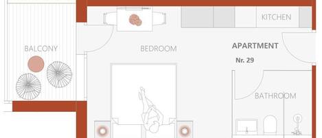 A floor plan of an apartment with a balcony, bedroom, bathroom, and kitchen.