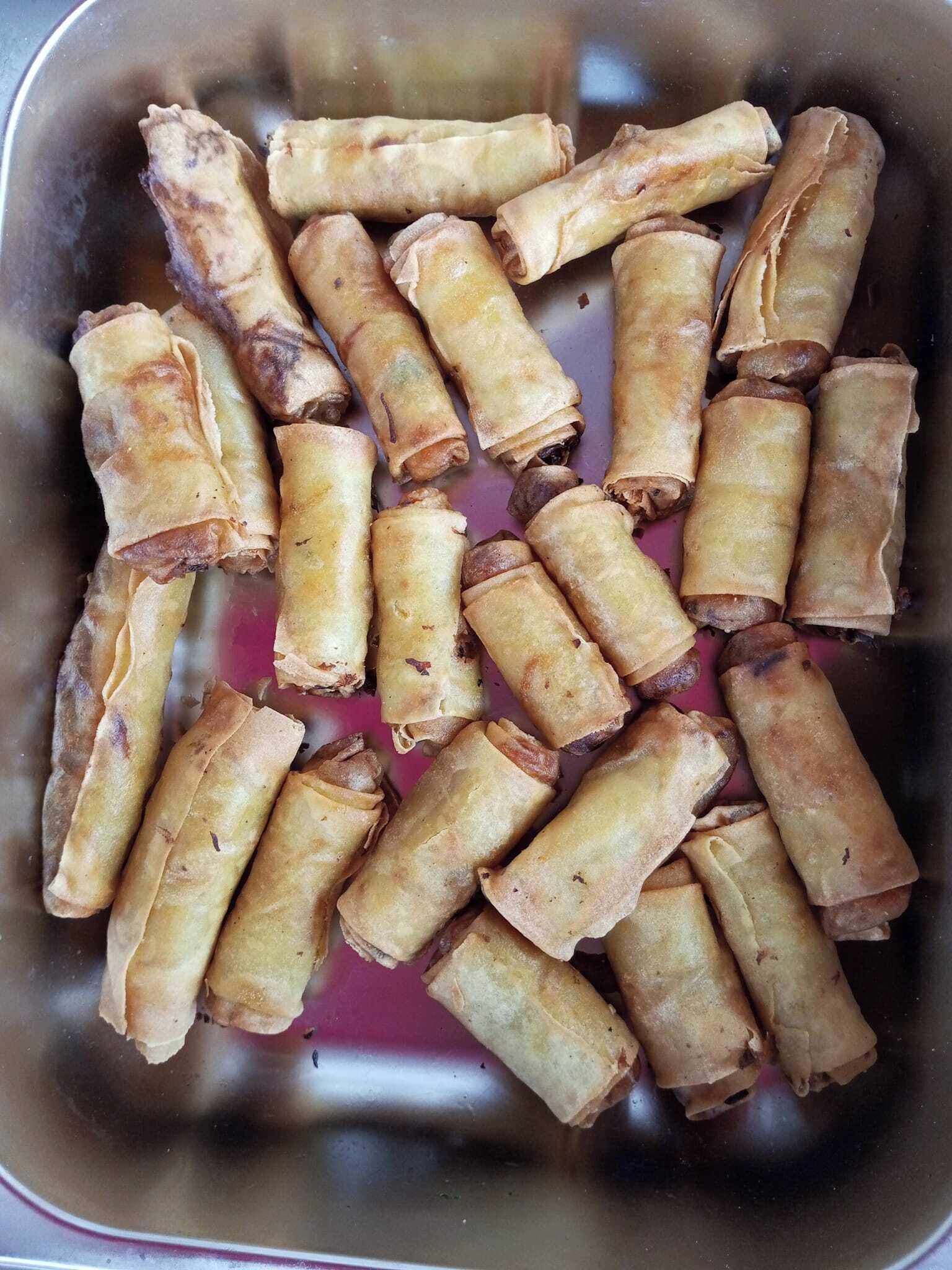 A tray of fried spring rolls.