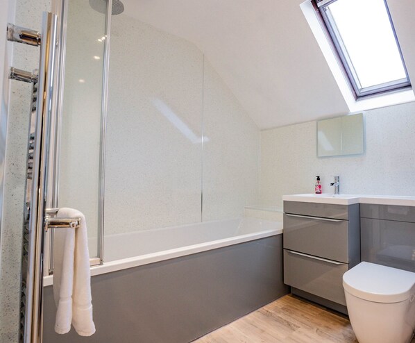 Shower, hair dryer, towels