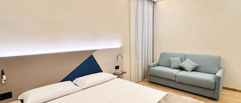 Classic Triple Room | Minibar, desk, iron/ironing board, free WiFi