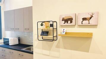 Mini-fridge, microwave, coffee/tea maker, electric kettle