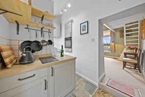 Fridge, microwave, oven, cookware/dishes/utensils