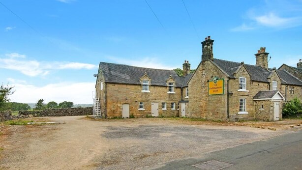 A traditional stone building with a sign indicating it is The Stamford Inn. - Host & Stay | Staffordshire Knot (Sheen)