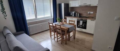 Fridge, microwave, stovetop, cookware/dishes/utensils