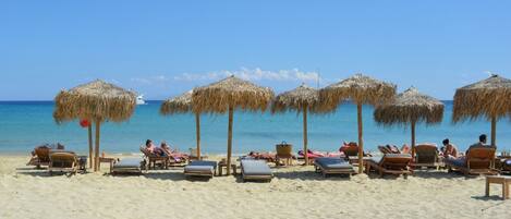 On the beach, beach towels