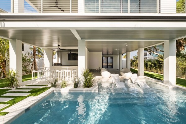 A heated pool - Luxury Anna Maria Island Rental: Rooftop Deck, Pool, & Golf Cart at Deckadence (Anna Maria)