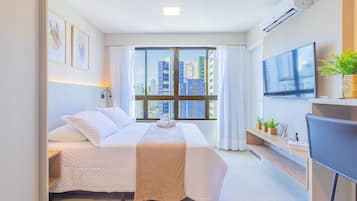 Apartamento premium | Wi-Fi de cortesia, roupa de cama