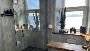 Shower, deep soaking tub, free toiletries, hair dryer