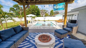 Outdoor pool, a heated pool - Palm Haus: 4bed:2bath/Heated Pool/Game Room/Putting Green/2 King beds (Cape Coral)