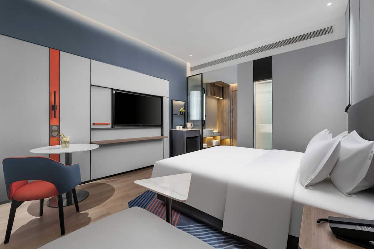 1 King Standard Extra Floor Space | 1 bedroom, down comforters, desk, blackout drapes