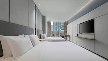 Habitación estándar, varias camas | Edredón, escritorio, cortinas blackout y insonorización