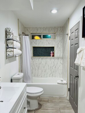 Hair dryer, towels, soap, toilet paper