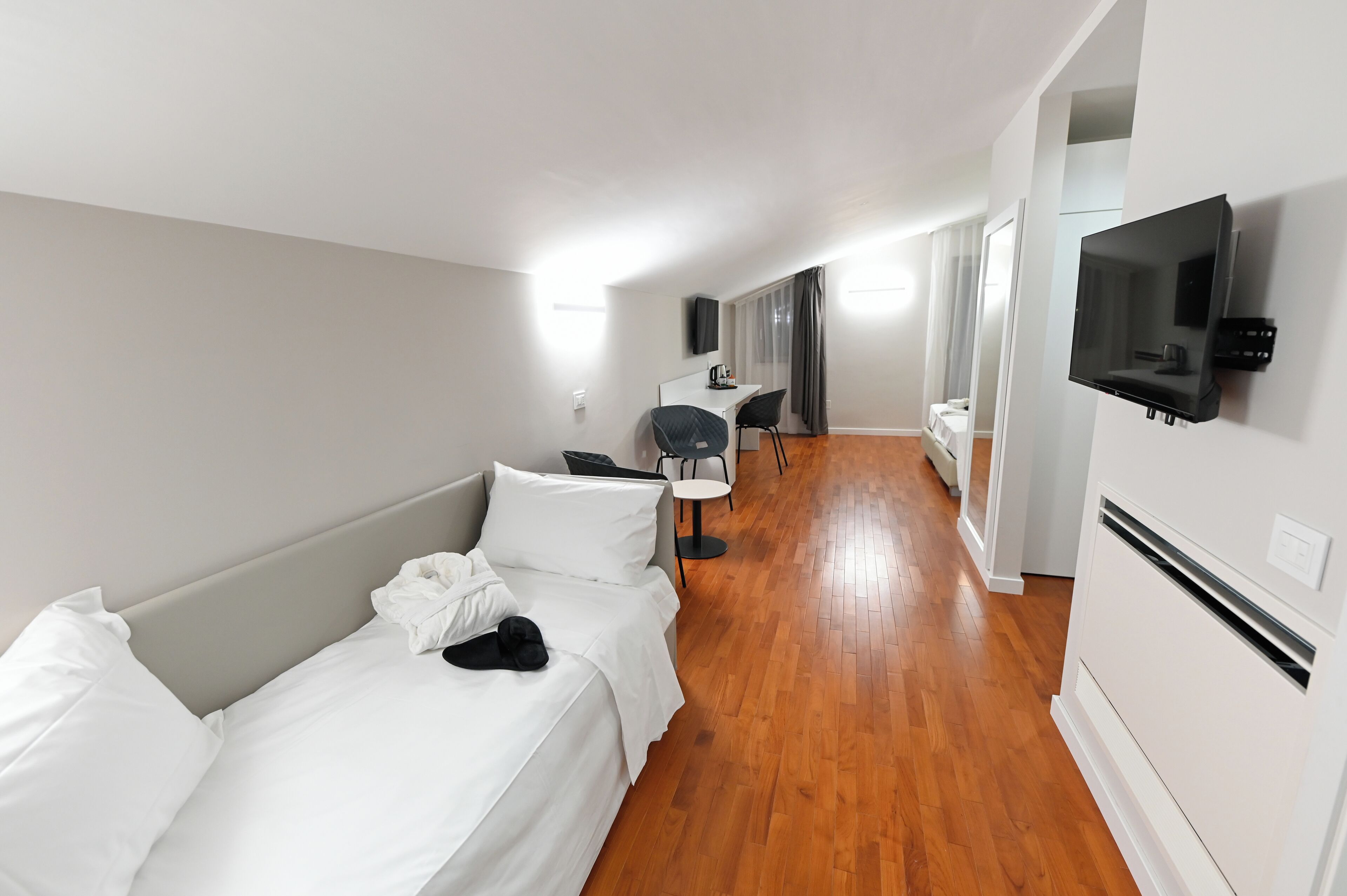 Chambre Quadruple Deluxe, balcon, vue cour intérieure