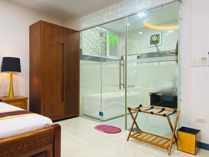Separate bathtub and shower, rainfall showerhead, free toiletries
