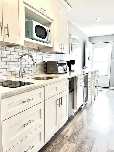 Stylish condo steps from the beach!  Elegant blend of comfort and convenience.