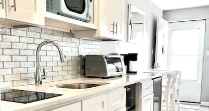 Stylish condo steps from the beach! Elegant blend of comfort and convenience.