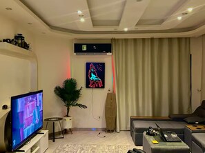 Luxury Villa, 3 Bedrooms, Kitchen, Ground Floor | Living area | 65-inch Smart TV with digital channels, Netflix, Hulu