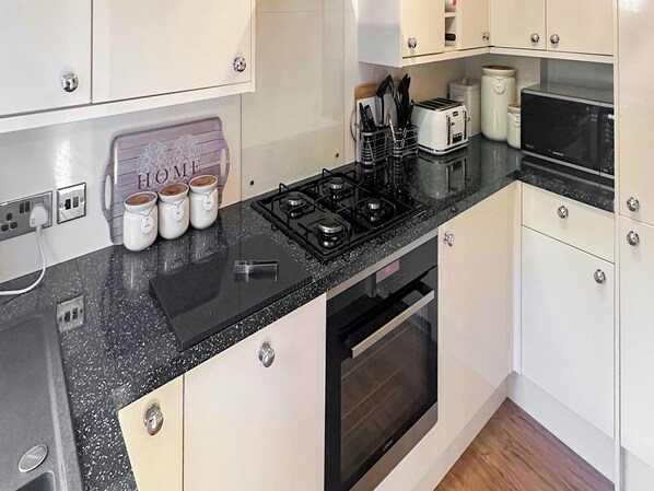 Dishwasher, high chair, cookware/dishes/utensils