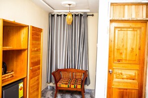 Quarto casal básico | Área de estar