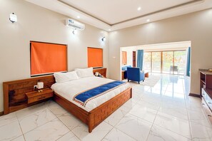 Deluxe suite, uitzicht op tuin | Woonruimte