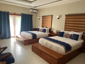 Deluxe Double Room, Sea View | 1 bedroom, in-room safe, desk, laptop workspace