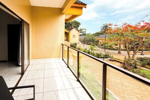 Deluxe suite, uitzicht op tuin | Balkon