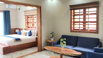 Chambre Supérieure, vue plage | Coin séjour