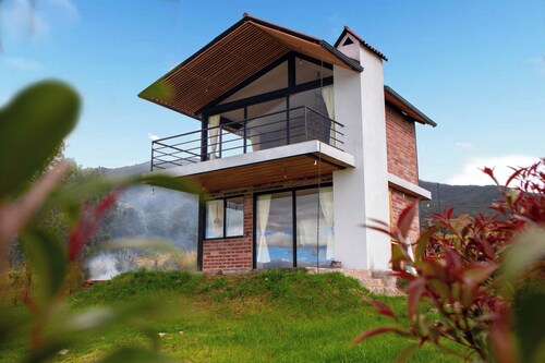 Exclusive Cabaña del Sol with a view of San Pablo Lake and Imbabura Volcano.