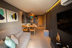 Apartment | Living area | Smart TV - Oceânica Cabo Branco By Carpediem (João Pessoa)