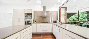 Rainforest Retreat - Serene 4-Bedroom Getaway with Bushland Views