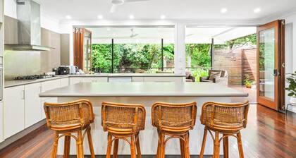 Rainforest Retreat - Serene 4-Bedroom Getaway with Bushland Views