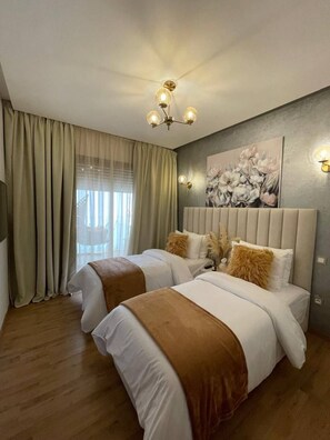 2 chambres, fer et planche à repasser, Wi-Fi, draps fournis