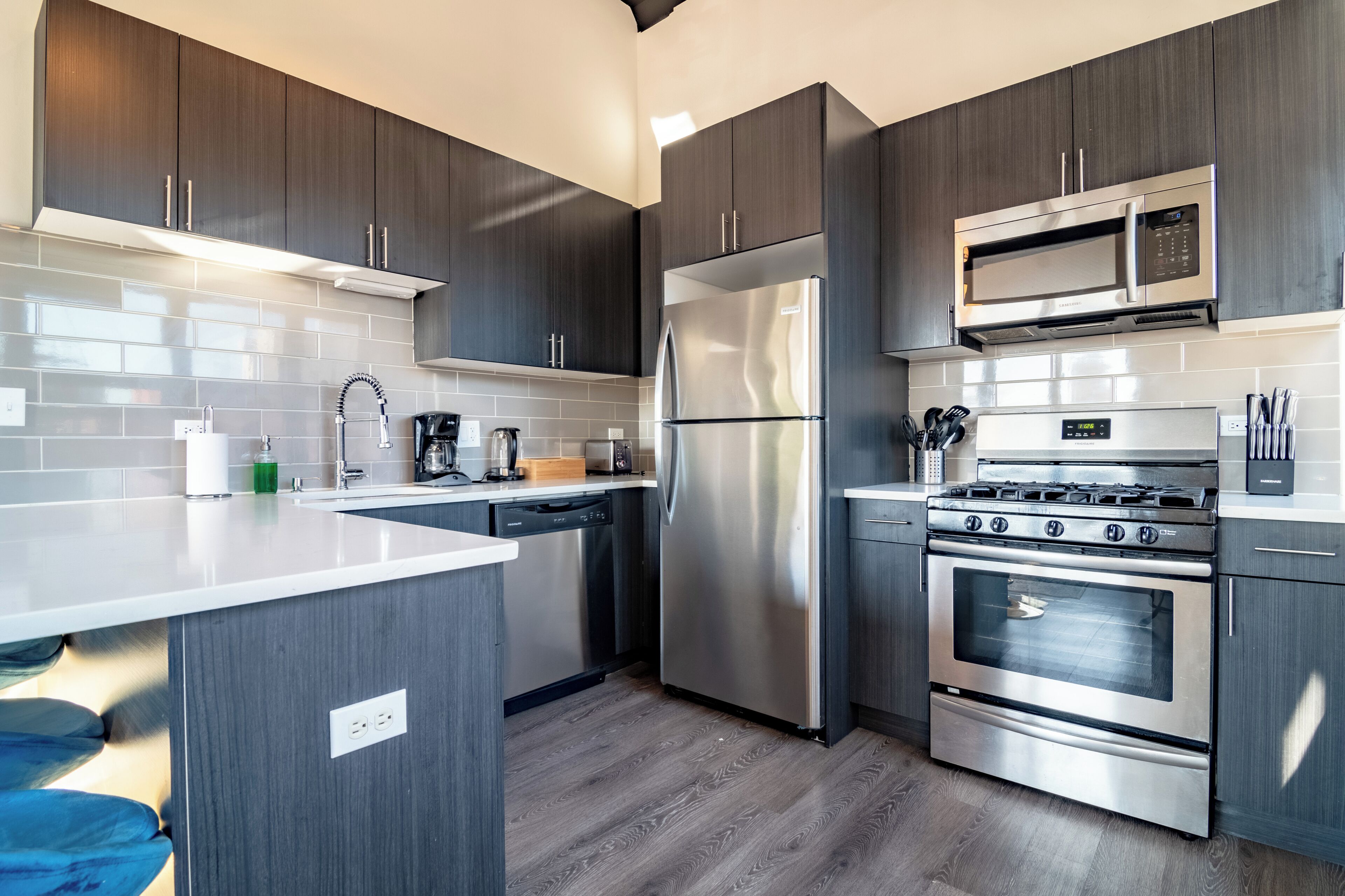 Coffee/tea maker, fridge, microwave, oven