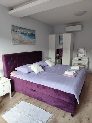 1 bedroom, desk, iron/ironing board, travel crib