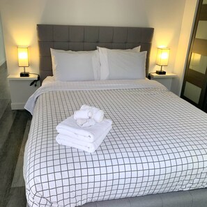 1 habitación, tabla de planchar con plancha, wifi y ropa de cama 