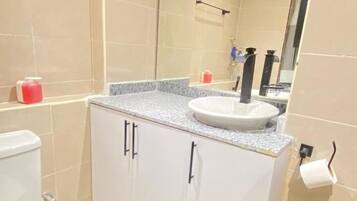 Exclusive Room | Bathroom | Bathrobes, towels, soap, shampoo