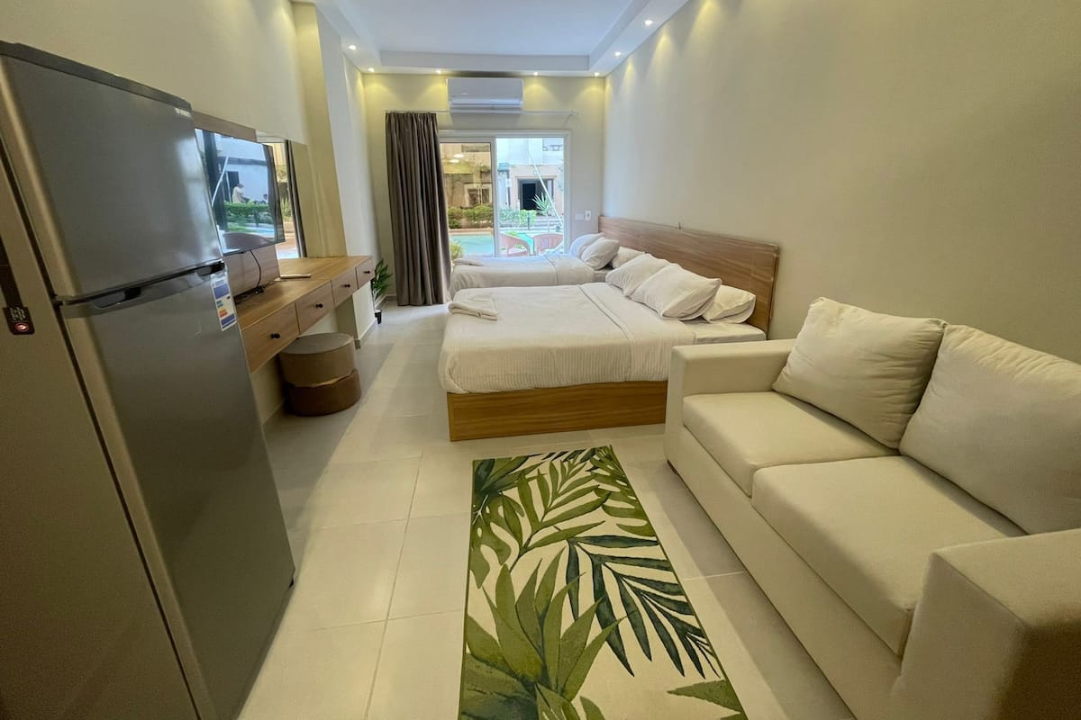 Traditional Apartment, Pool View | Individually decorated, individually furnished, desk, laptop workspace