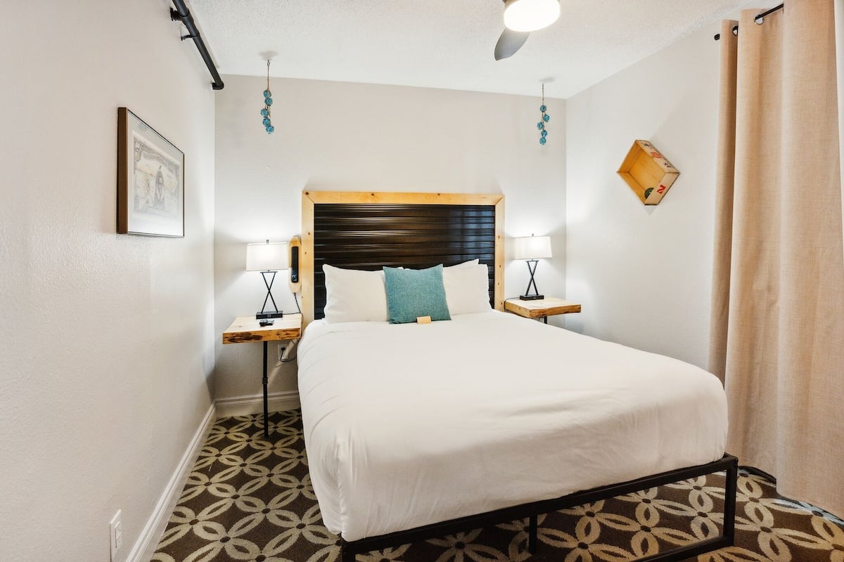 Pillow-top beds, desk, laptop workspace, blackout curtains