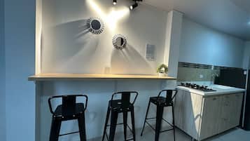 Family Double Room Single Use, 2 Bedrooms | Living area | TV