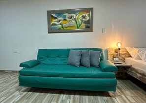 Luxury Studio Suite, 1 Bedroom, City View | Living area | TV - Hospedarte Cali (Cali)