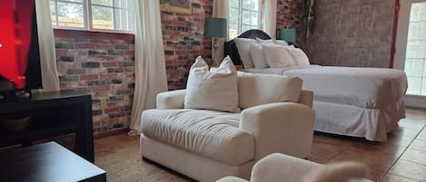 1 bedroom, desk, iron/ironing board, travel crib